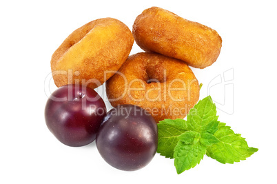 Doughnuts with mint and plums