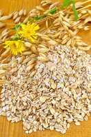 Oat flakes with yellow flowers
