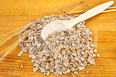 Rye flakes with a spoon
