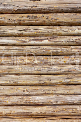 Wooden logs wall of rural house background