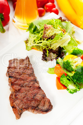 juicy BBQ grilled rib eye ,ribeye steak and vegetables