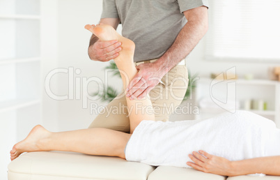 A woman's leg being massaged