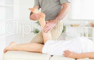 A woman's leg being massaged