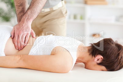 Man massaging a cute woman