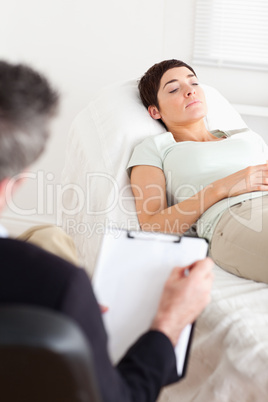Psychologist talking to a female patient