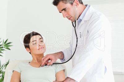 Doctor examining a patient