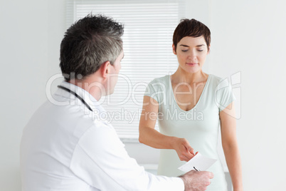 Beautiful Woman receiving a prescription