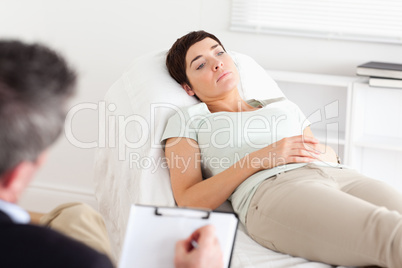 Male Doctor talking to a female patient