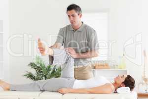 Chiropractor working with a customer