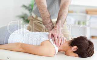 Man massaging a woman