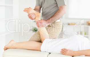 Female customer's leg being massaged