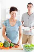 Portrait of a happy Couple preparing lunch