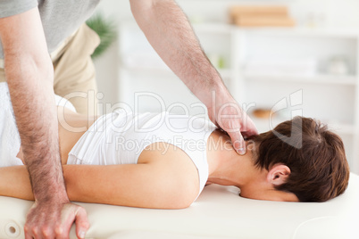 Young woman being massaged