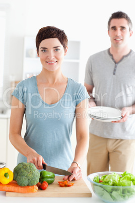 Portrait of a Smiling Couple preparing lunch