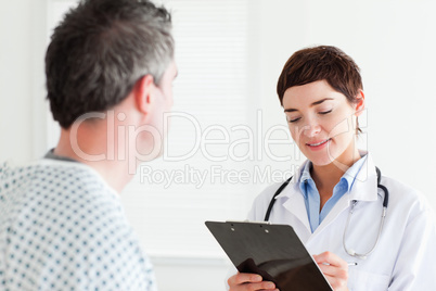 Doctor talking to a male patient