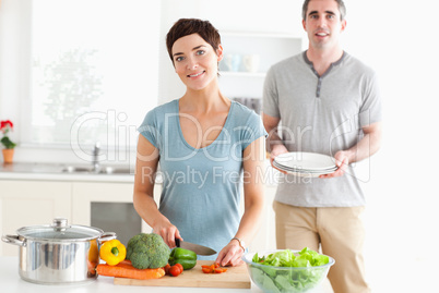 Smiling Couple preparing lunch