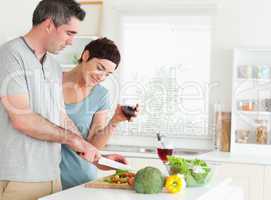Couple with wine and vegetables