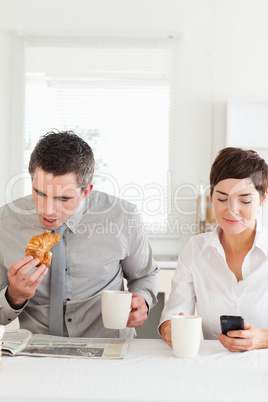 Cute couple having breakfast together