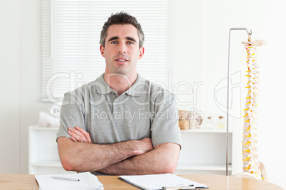 Doctor sitting at a table