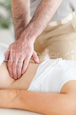 Guy massaging a person's back