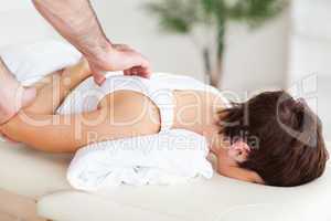 Gorgeous Woman getting a shoulder-massage