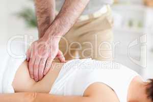 Masseur massaging a woman