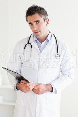 Male Doctor looking into the camera