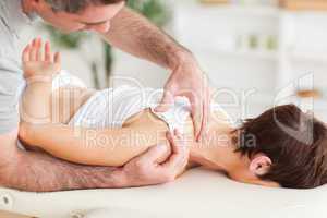 Man massaging a woman's shoulder