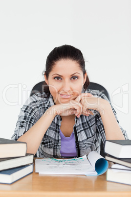 Cute young student looking into camera