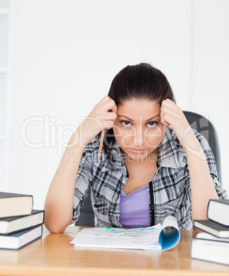 Stressed student looking to camera
