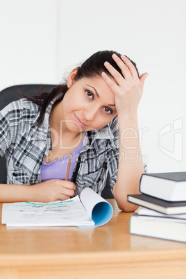 Smiling student with homework