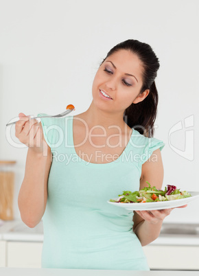A young woman with salad