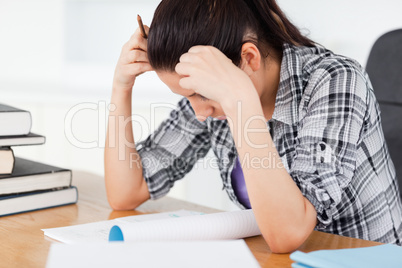 Stressed student learning between books