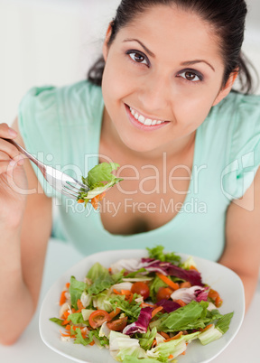 Young woman with salad