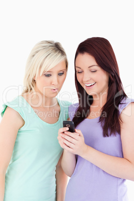 Portrait of charming women with a cellphone