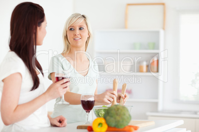 Young Women cooking dinner