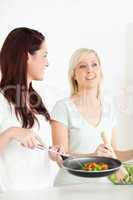 Women cooking dinner