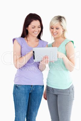 Charming women with a tablet