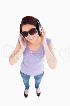 Gorgeous Woman with headphones and sunglasses