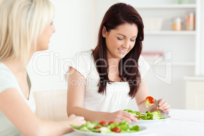 Portrait of beautiful Women eating salad