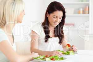 Portrait of beautiful Women eating salad