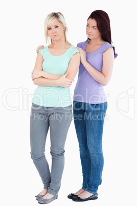 Young Woman comforting sad friend