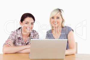 Pretty women learning with laptop