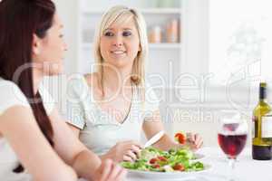 Portrait of Smiling Women eating salad