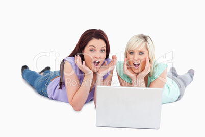 Shocked women with a laptop