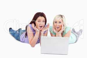 Shocked women with a laptop