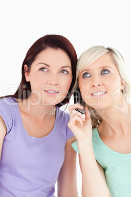 Portrait of smiling women on the phone