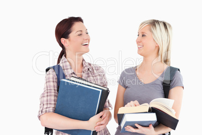 Laughing students looking at each other