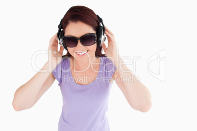 Beautiful Woman with headphones and sunglasses