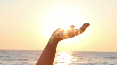 Sun in hand